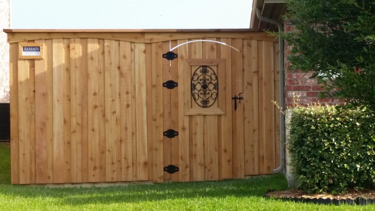 Natural cedar 8ft fence with ornamental gate window