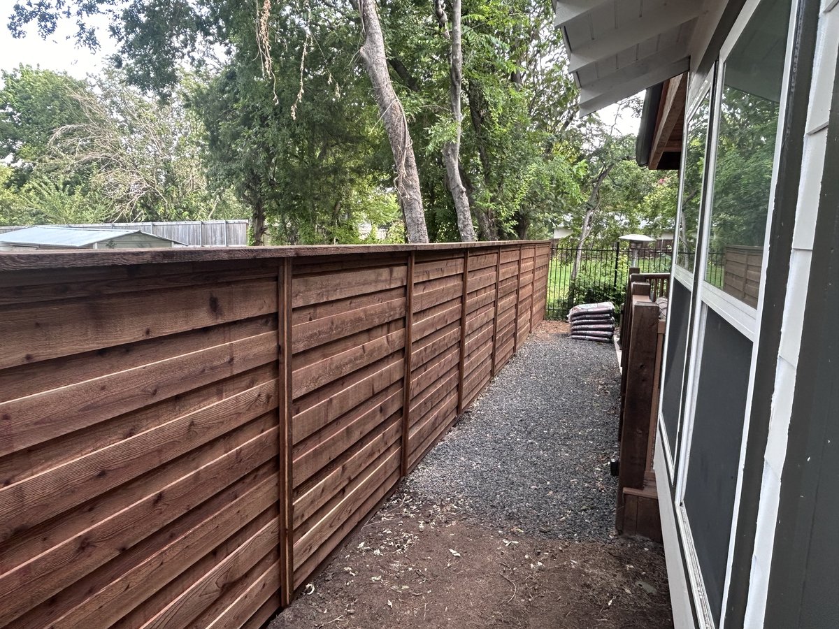 Horizontal slat cedar fence