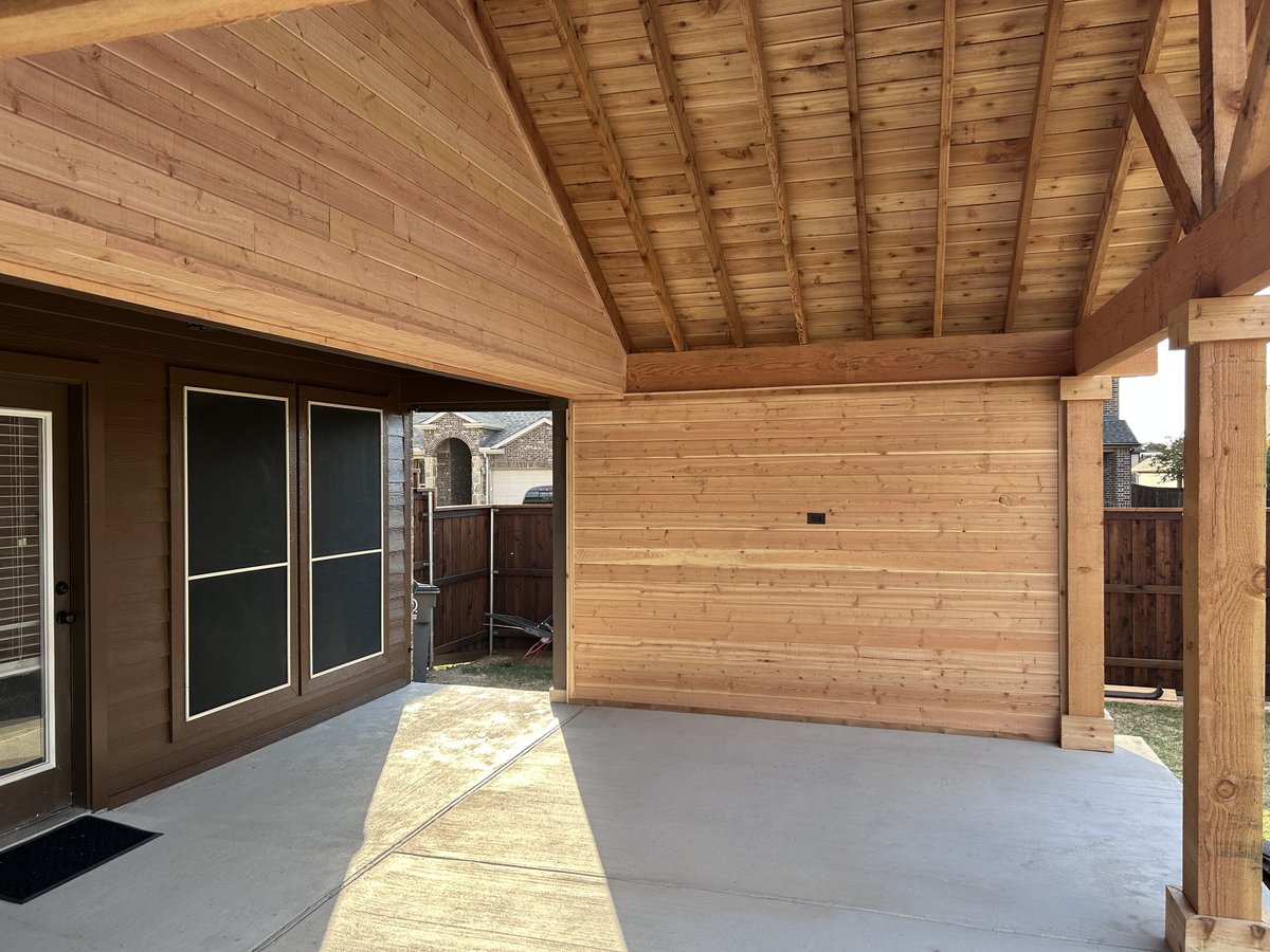Cedar patio cover with vaulted ceiling and TV wall
