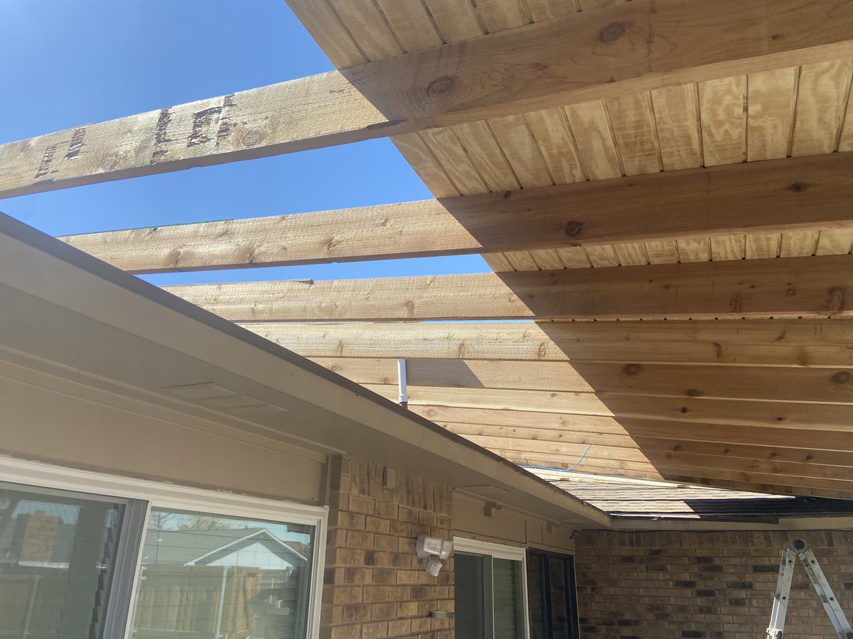 Pergola with open cedar rafters