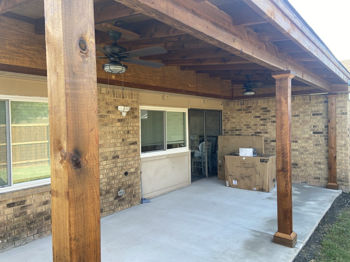 Patio cover exterior with stained posts