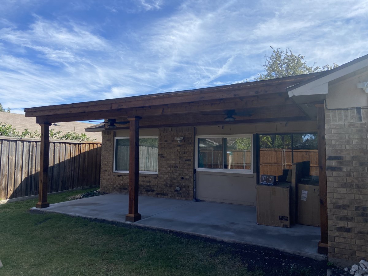 Full patio cover exterior view from backyard