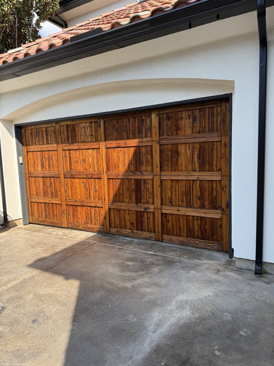Stained Mediterranean style garage door